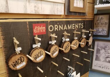 wooden ornaments display on peg board