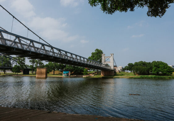 waco suspension bridge in distance over brazos river